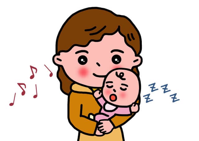 赤ちゃんに子守歌をうたうママ